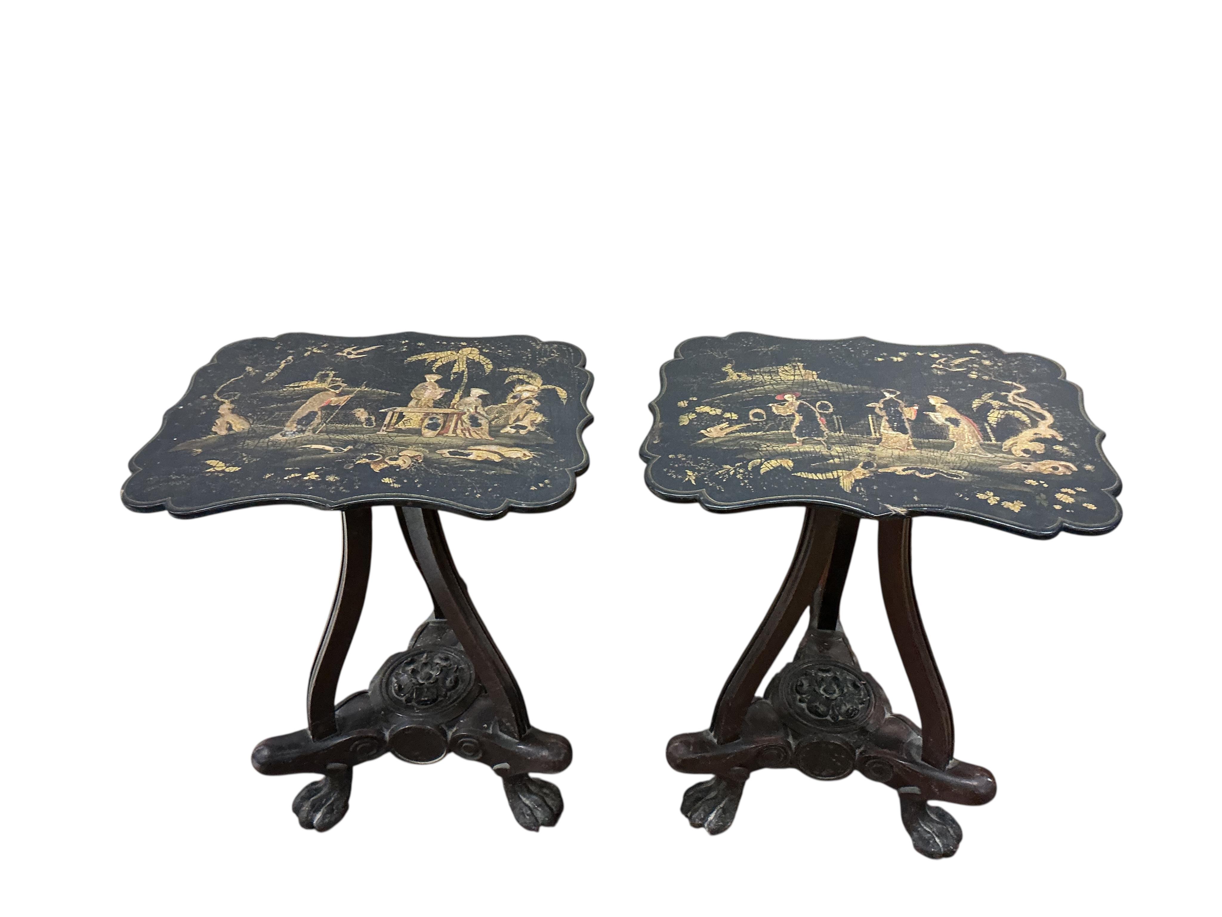 A pair of chinoiserie lacquer papier maché occasional tables with mahogany and cast iron underframes converted from polescreens, width 37cm, depth 29cm, height 46cm
